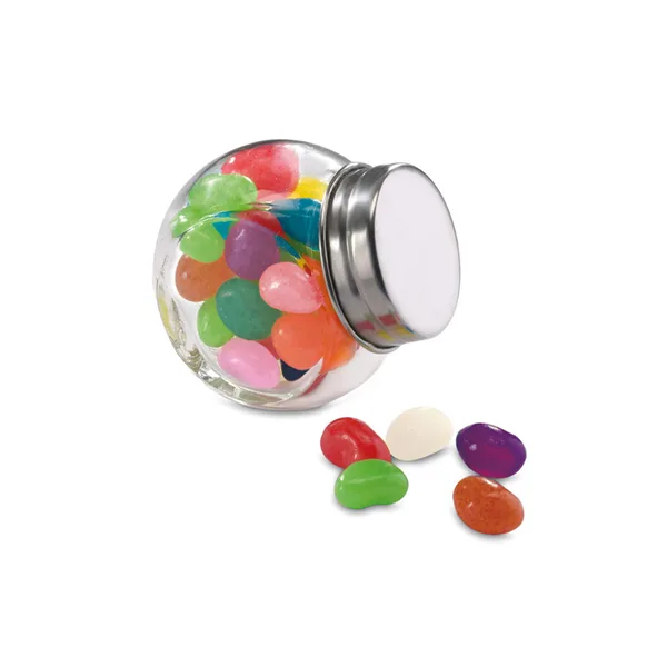 Multicolour jelly beans in a glass container jar with metallic cover