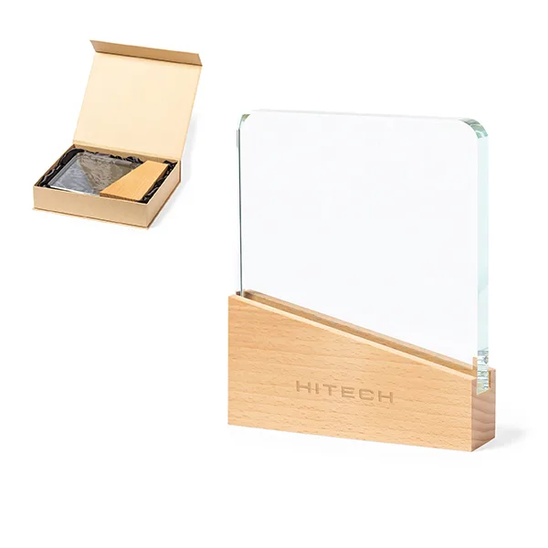 Commemorative plaque made of thick and resistant glass, with a natural wood base